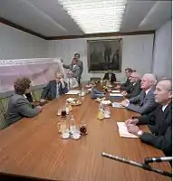 Lead developer Jens Knobloch presents a 1:300 scale drawing of the megabit chip to state leaders Erich Honecker and Günter Mittag (12 September 1988)